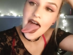 Girl shows tongue