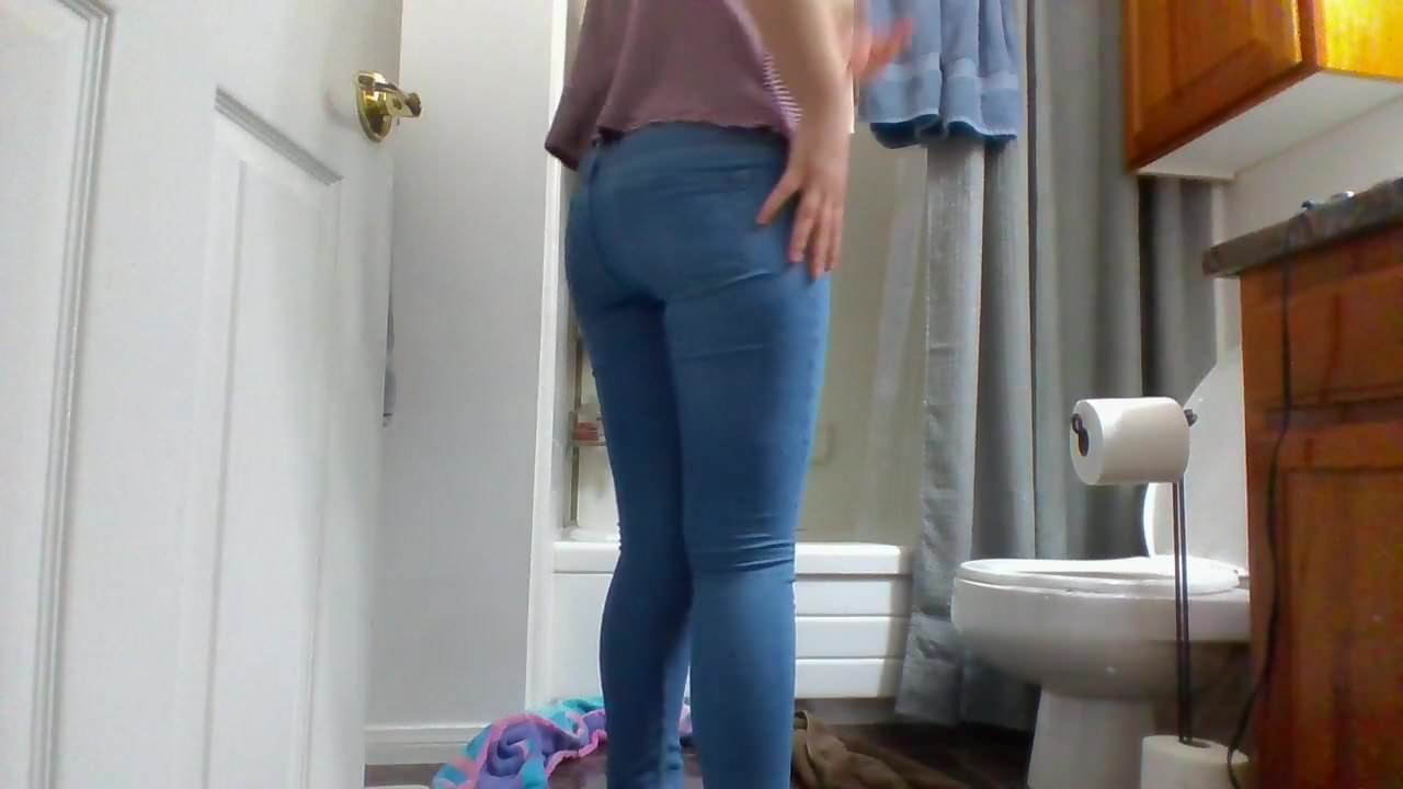 Girl wets her jeans